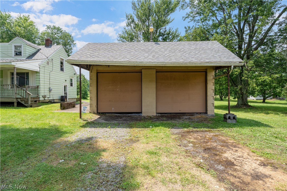 6324 Struthers Road Youngstown, OH 44514 - Photo 11 of 42 Two-car detached garage with a gabled roof and two individual garage doors