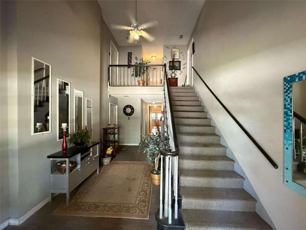 125 Rue Fontaine Lithonia, GA 30038 - Photo 2 of 6 a view of entryway and hall with wooden floor