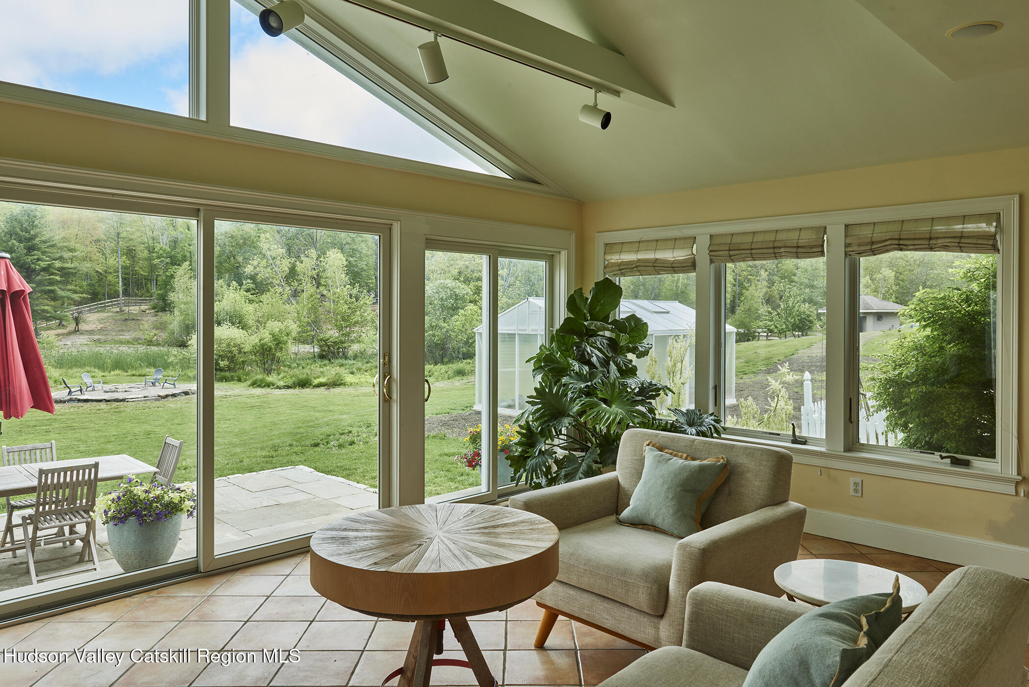 864 West End Road Hillsdale, NY 12529 - Photo 16 of 42 a living room with patio and furniture