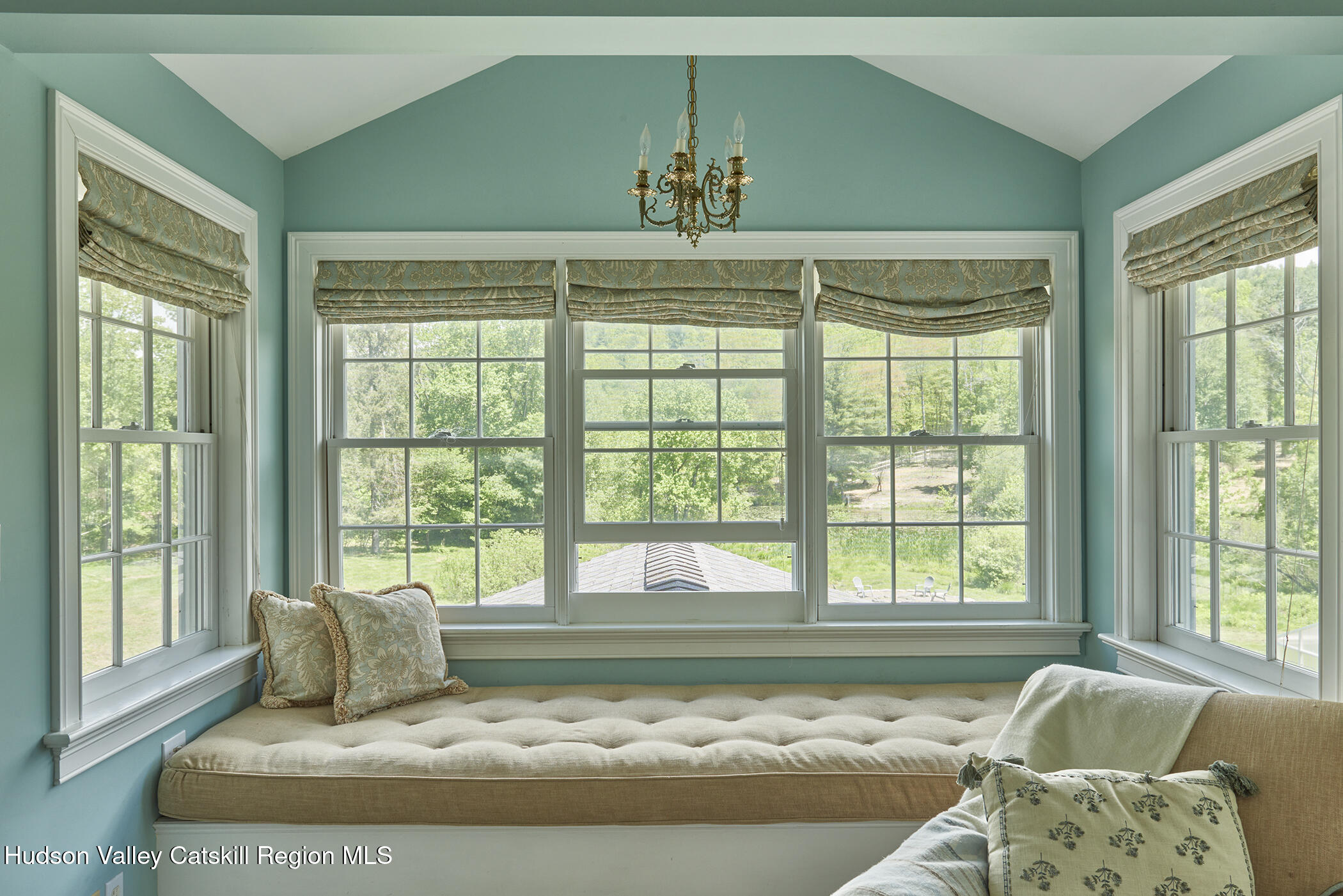 864 West End Road Hillsdale, NY 12529 - Photo 21 of 42 a living room with couch and a large window