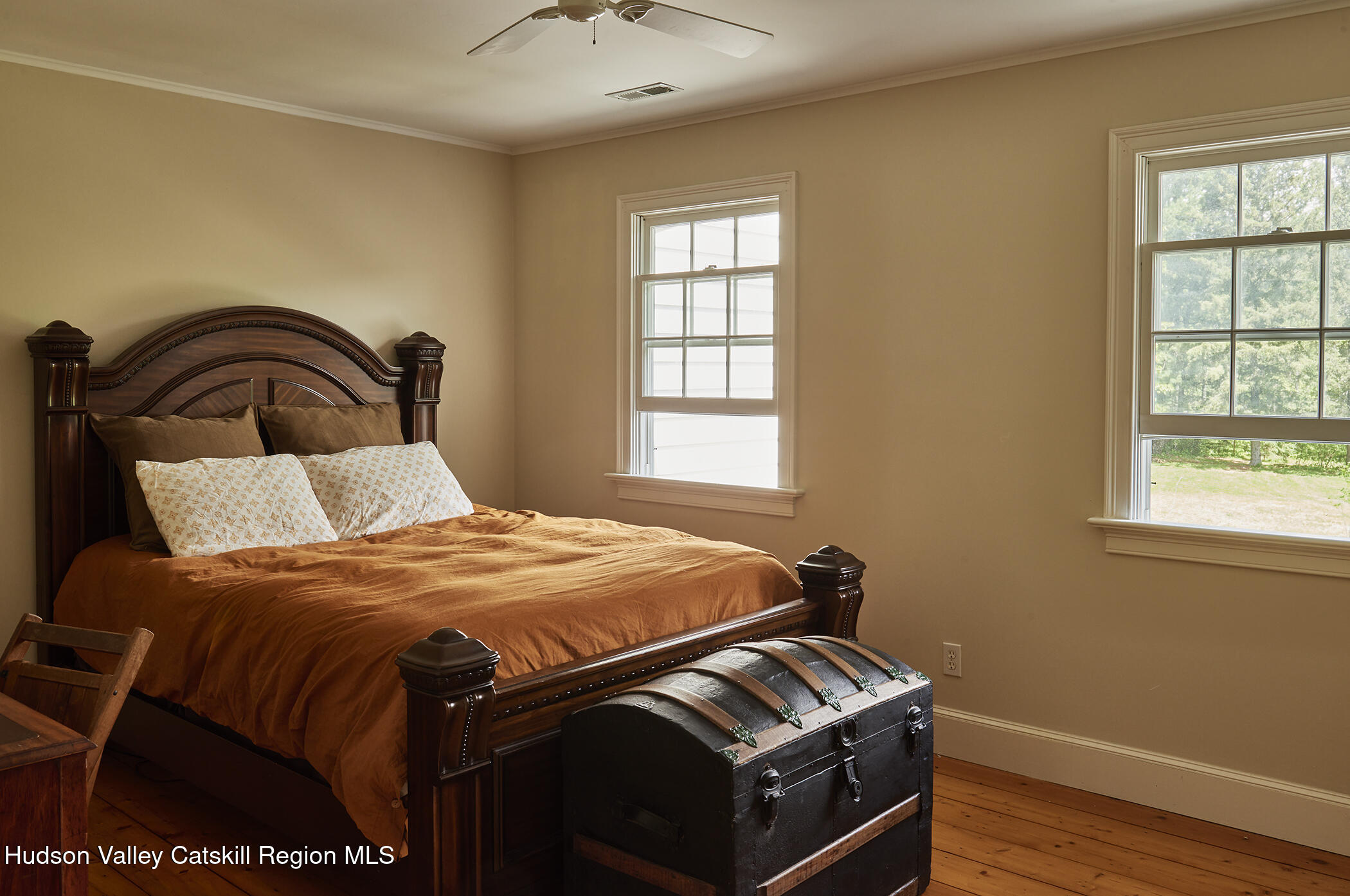 864 West End Road Hillsdale, NY 12529 - Photo 24 of 42 a bedroom with a bed and wooden floor