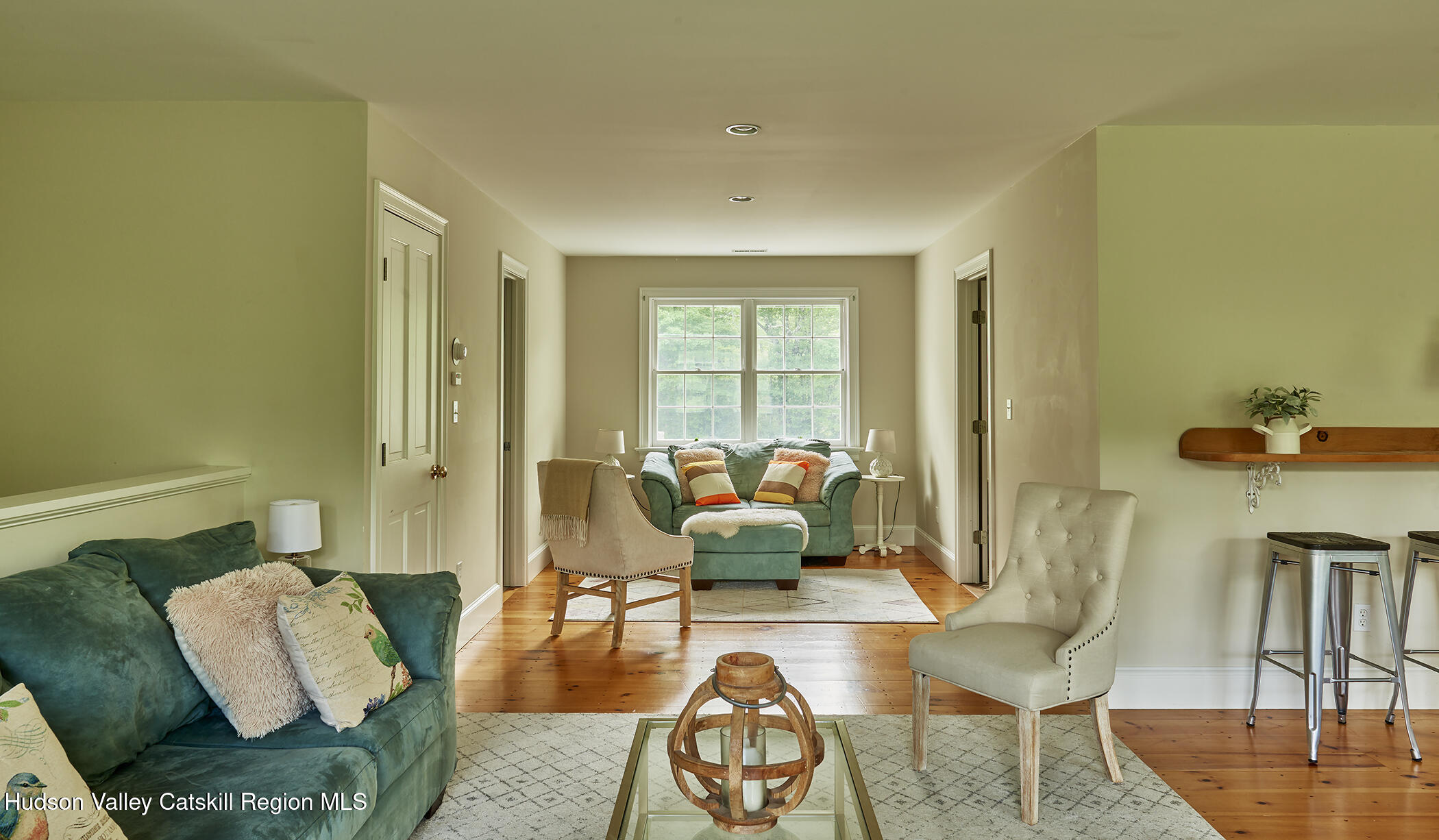 864 West End Road Hillsdale, NY 12529 - Photo 30 of 42 a living room with furniture and a table