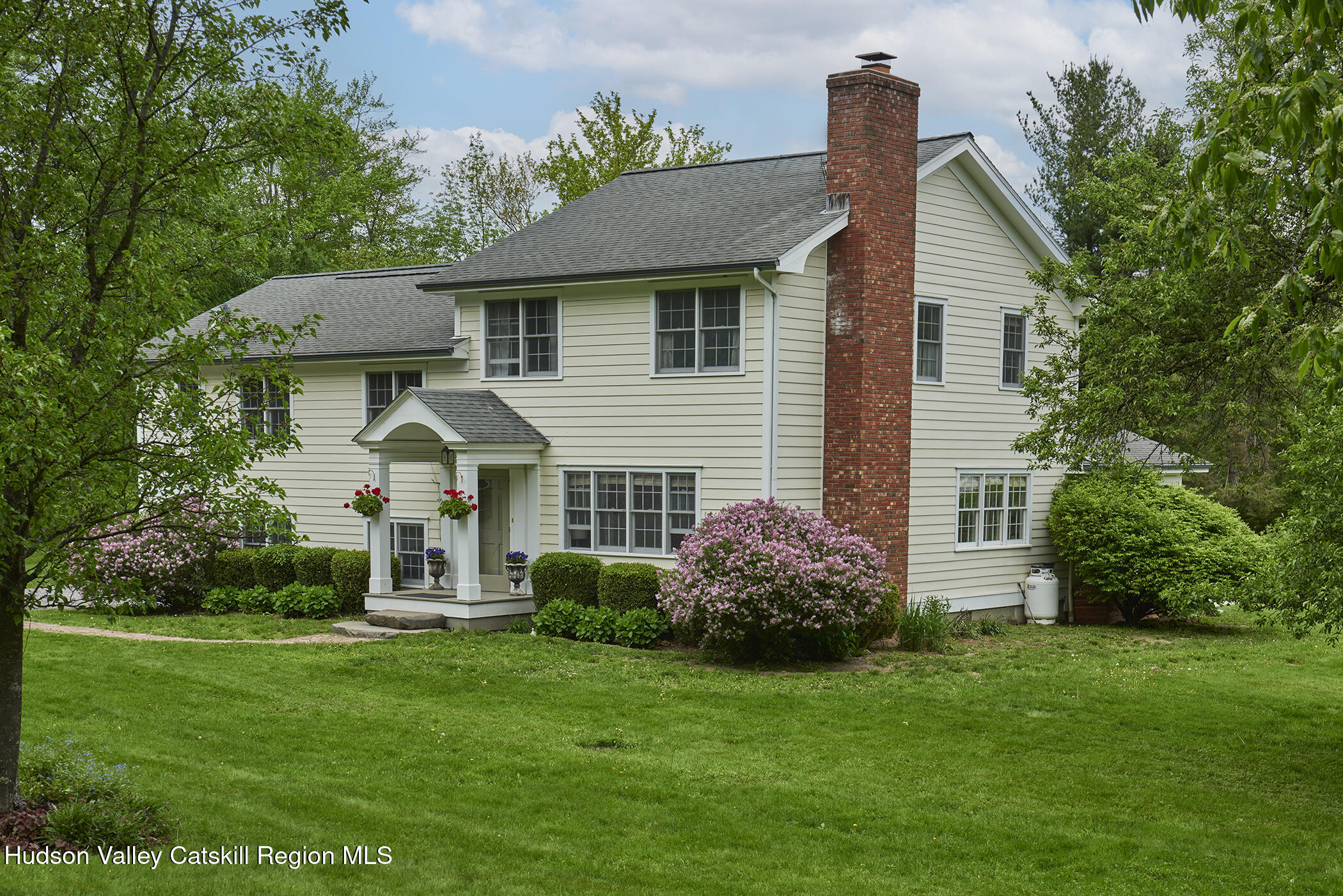 864 West End Road Hillsdale, NY 12529 - Photo 4 of 42 front view of a house with a yard