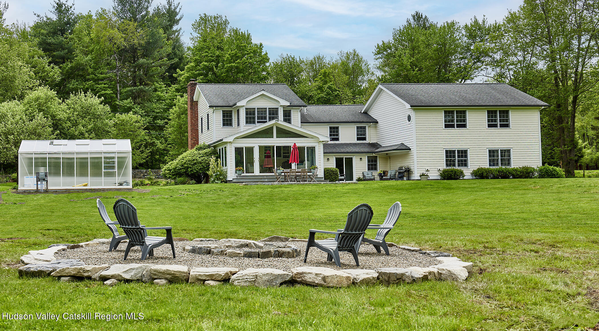 864 West End Road Hillsdale, NY 12529 - Photo 8 of 42 a view of a house with a yard porch and sitting area