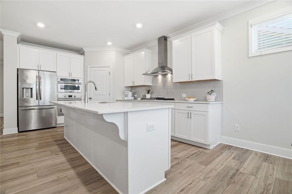 1613 Saddlegate Drive Canton, GA 30114 - Photo 7 of 32