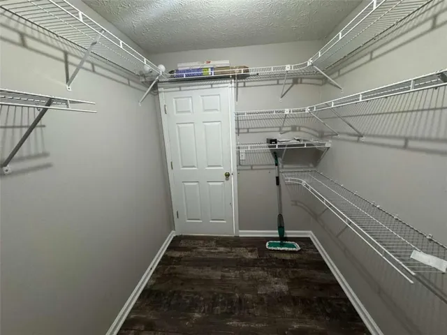 a view of a room with racks on the wall