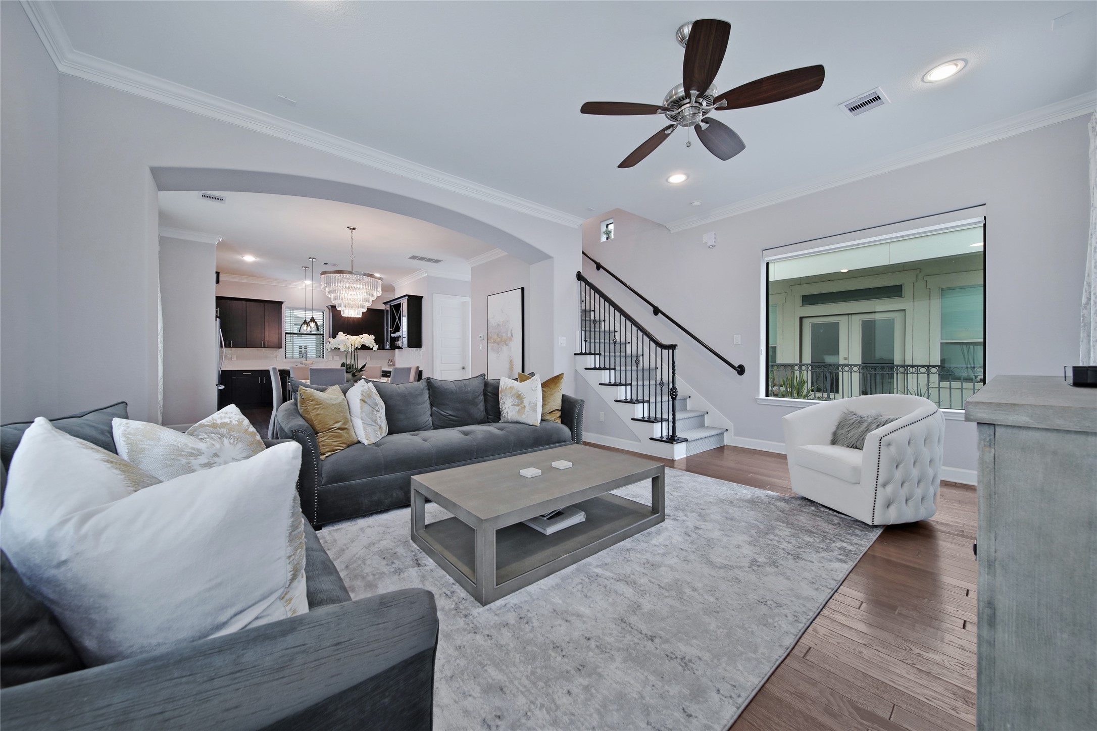 5703 Kansas Street Houston, TX 77007 - Photo 11 of 20 a living room with furniture and a ceiling fan