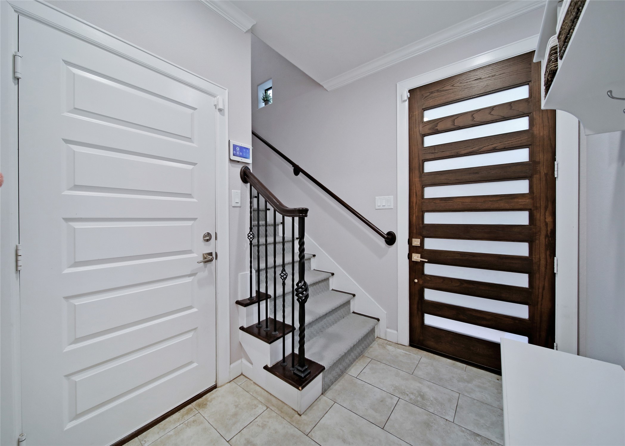 5703 Kansas Street Houston, TX 77007 - Photo 3 of 20 a view of entryway with stairs and a window