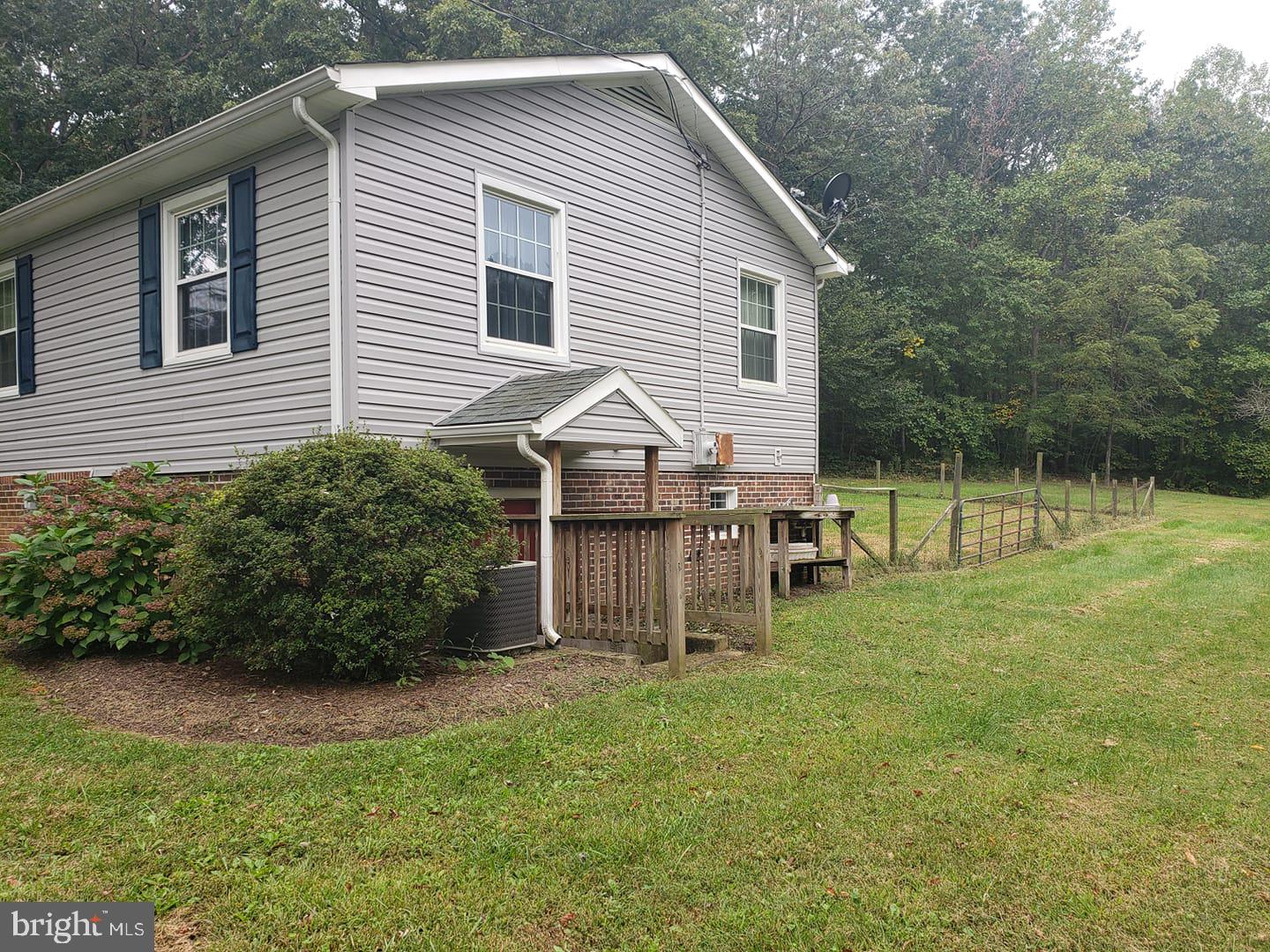 6004 Burr Hill Road Rhoadesville, VA 22542 - Photo 17 of 21 Exit to Side Yard from Partial Basement!