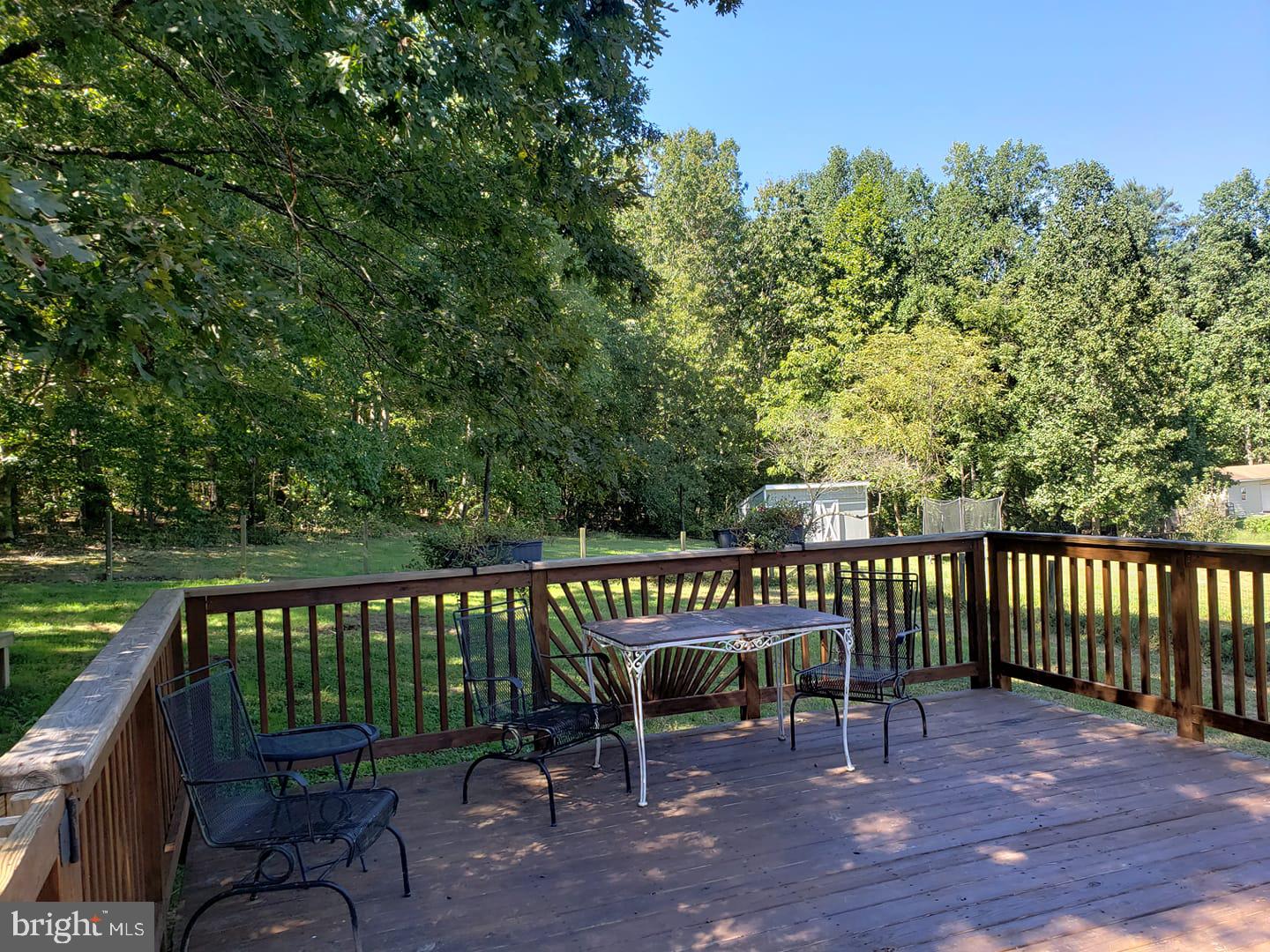6004 Burr Hill Road Rhoadesville, VA 22542 - Photo 18 of 21 Deck off Kitchen leads to Fenced Yard!