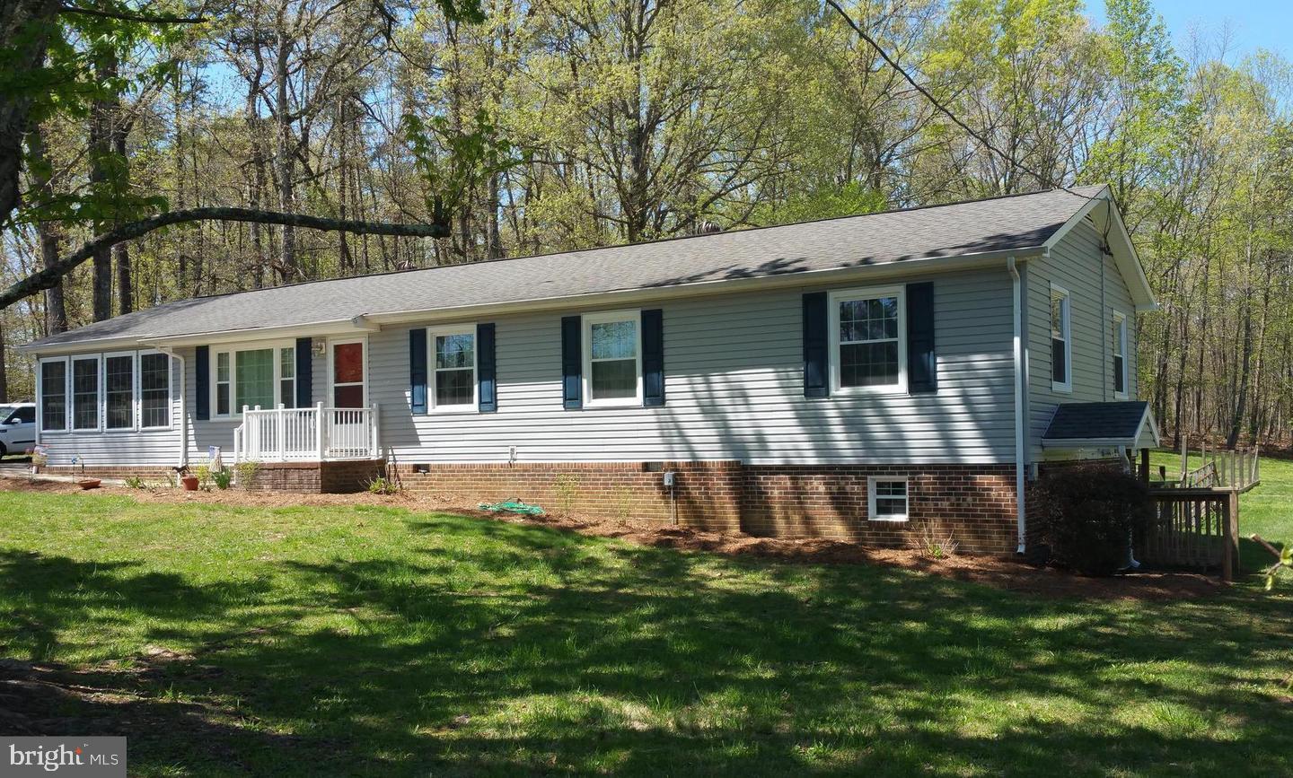 6004 Burr Hill Road Rhoadesville, VA 22542 - Photo 21 of 21 Unfinished Basement area 12 x 20 with Wood Stove