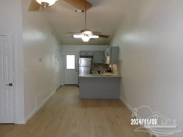 a view of kitchen and chandelier