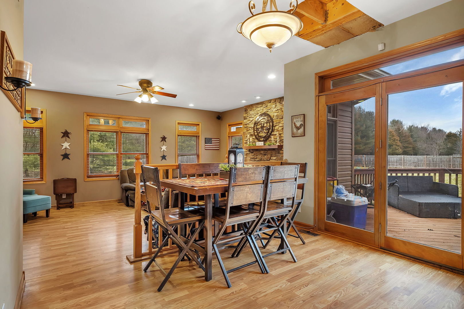 36963 Irish Lane Custer Park, IL 60481 - Photo 11 of 49 a view of a dining room with furniture window and wooden floor
