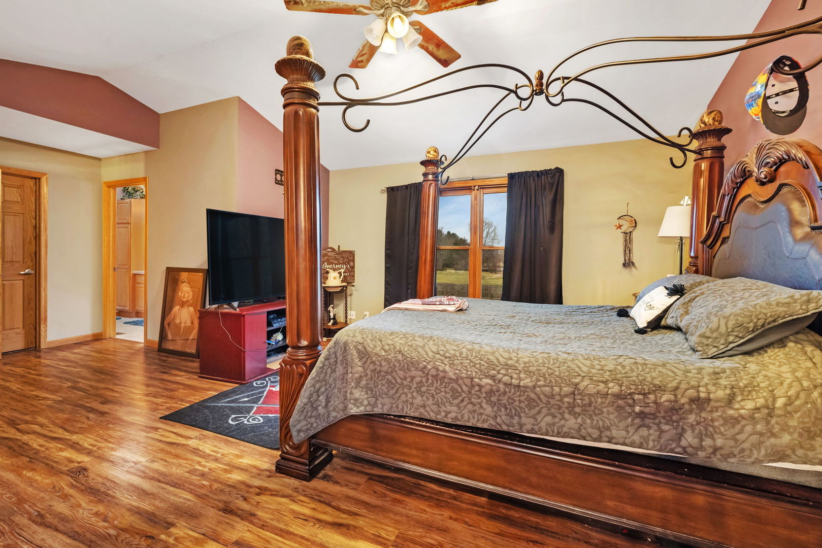 36963 Irish Lane Custer Park, IL 60481 - Photo 18 of 49 a bedroom with a bed and a flat screen tv