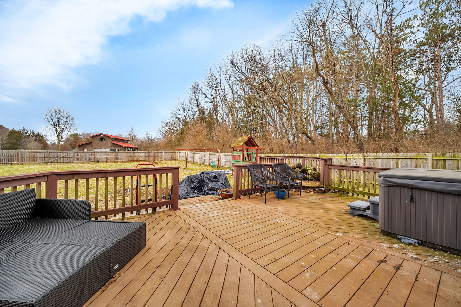 36963 Irish Lane Custer Park, IL 60481 - Photo 30 of 49 a view of a roof deck with wooden floor and seating