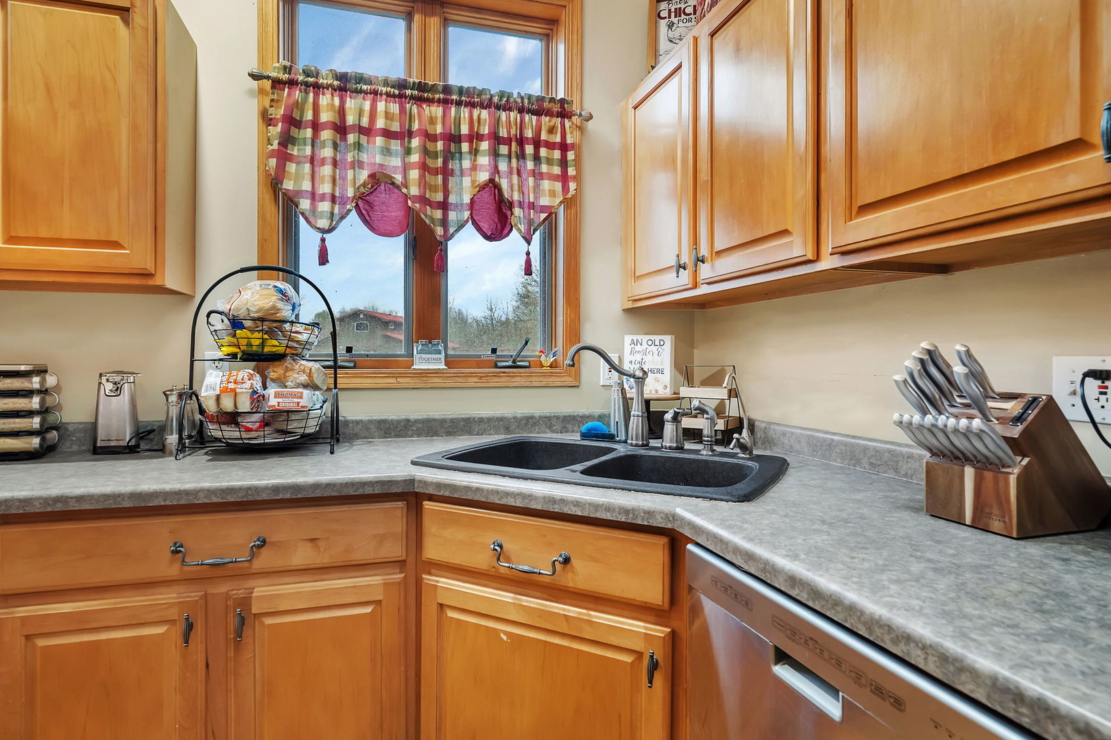 36963 Irish Lane Custer Park, IL 60481 - Photo 7 of 49 a kitchen with stainless steel appliances granite countertop a sink and cabinets
