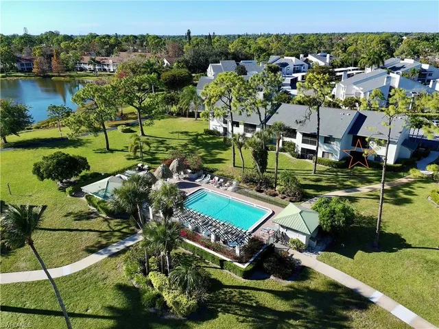 a view of a lake with a house