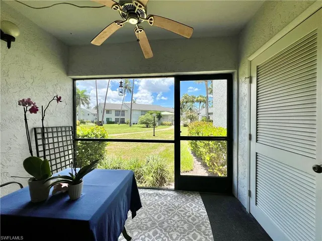 a view of a room with a large window