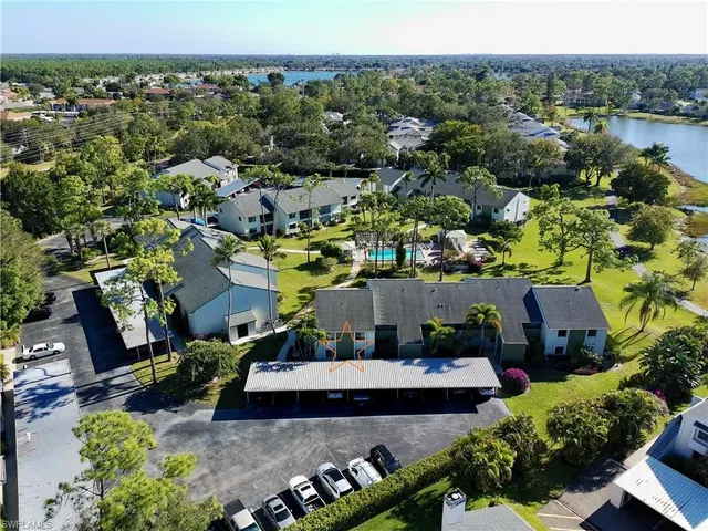 an aerial view of a house with a garden