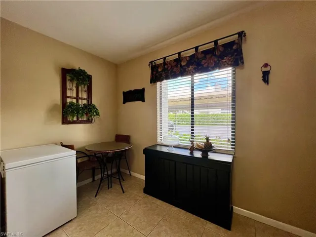 a room with a table and a window