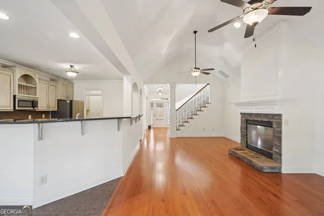 a view of a livingroom with furniture a fireplace
