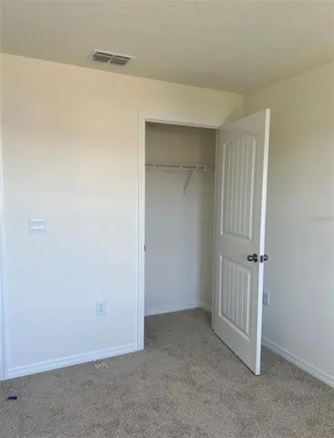 an empty room with a door