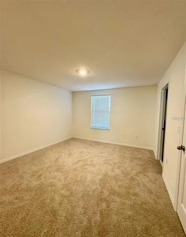 an empty room with a natural light