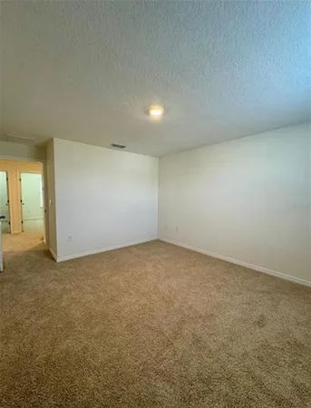 an empty room with a door