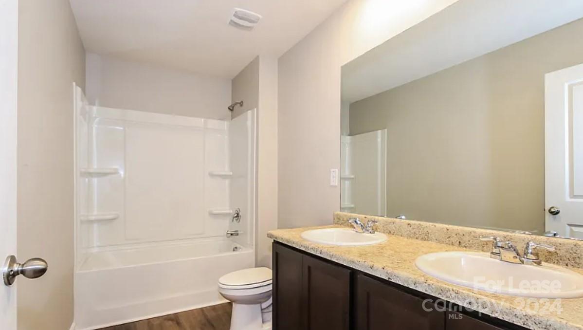 148 Lookout Loop North Augusta, SC 29841 - Photo 11 of 14 a bathroom with a granite countertop sink toilet and shower