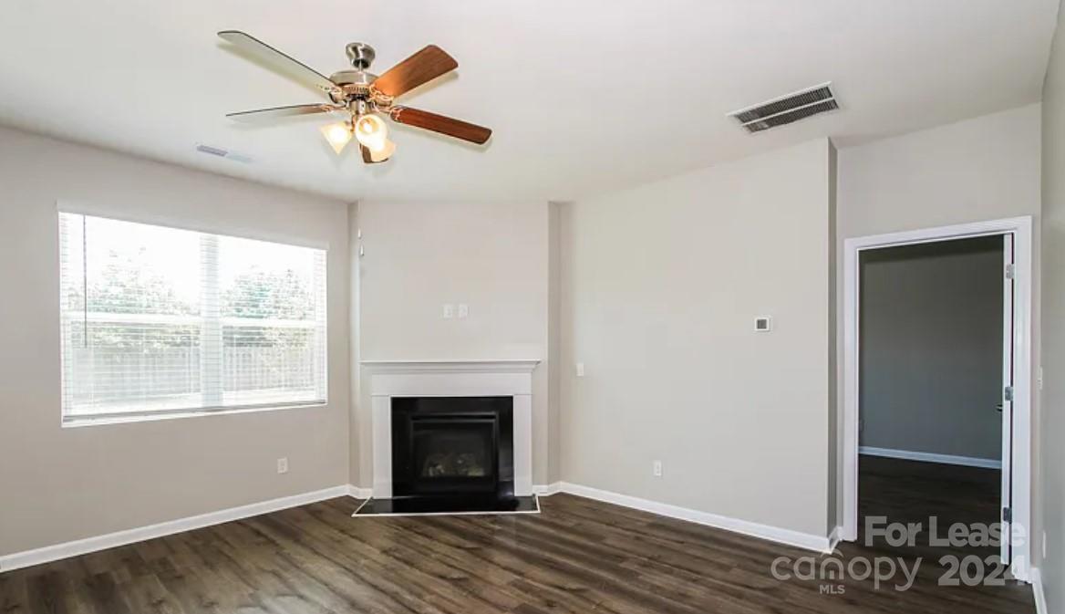 148 Lookout Loop North Augusta, SC 29841 - Photo 3 of 14 a view of an empty room with wooden floor and a window