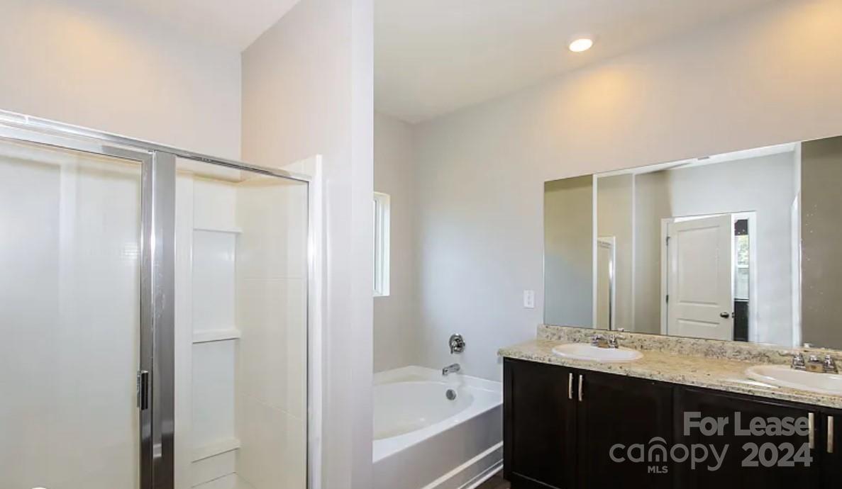 148 Lookout Loop North Augusta, SC 29841 - Photo 10 of 14 a bathroom with a granite countertop sink and a mirror