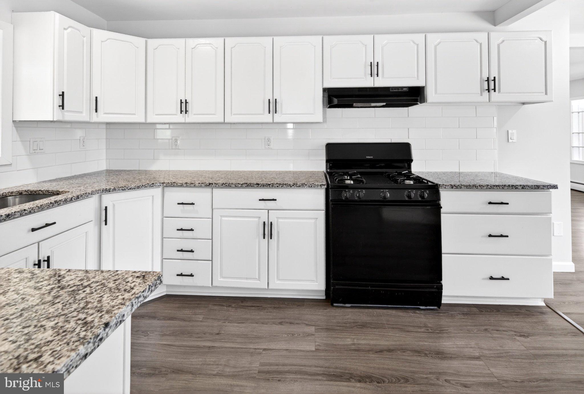 9081 Dumhart Road Laurel, MD 20723 - Photo 8 of 45 Modern kitchen with sleek finishes.