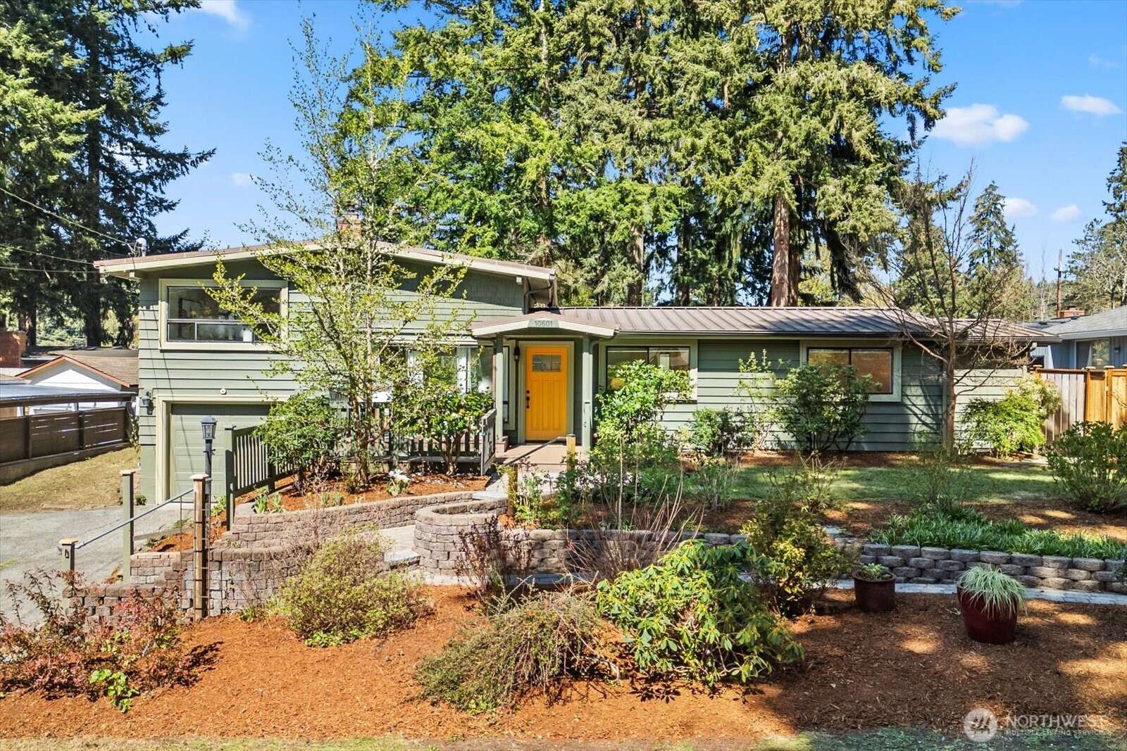 10601 242nd Place Southwest Edmonds, WA 98020 - Photo 2 of 35 a view of a yard in front of house