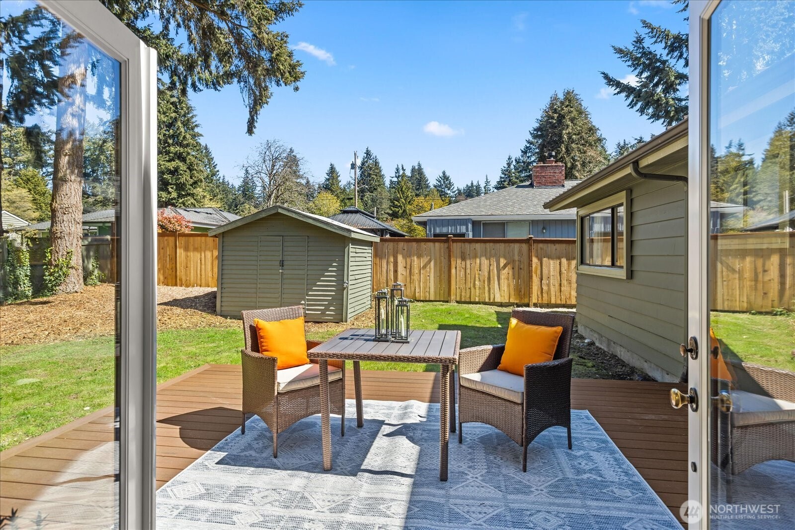 10601 242nd Place Southwest Edmonds, WA 98020 - Photo 27 of 35 a backyard of a house with outdoor seating
