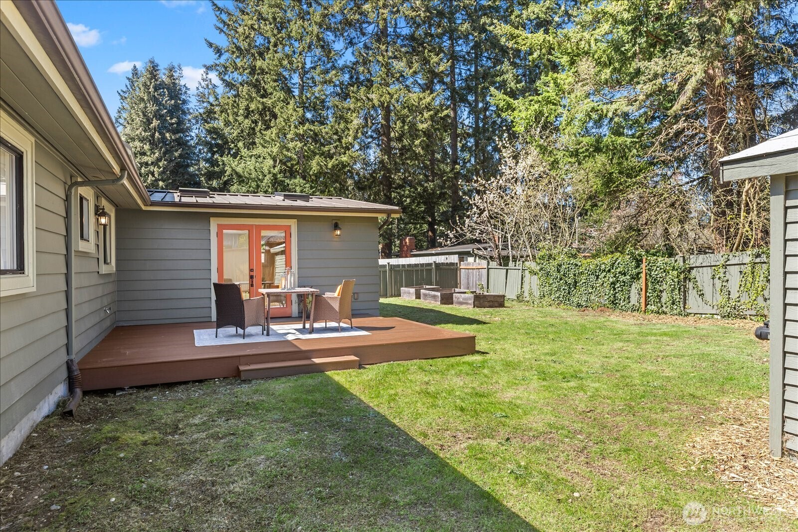 10601 242nd Place Southwest Edmonds, WA 98020 - Photo 29 of 35 a front view of a house with a yard garage and outdoor seating