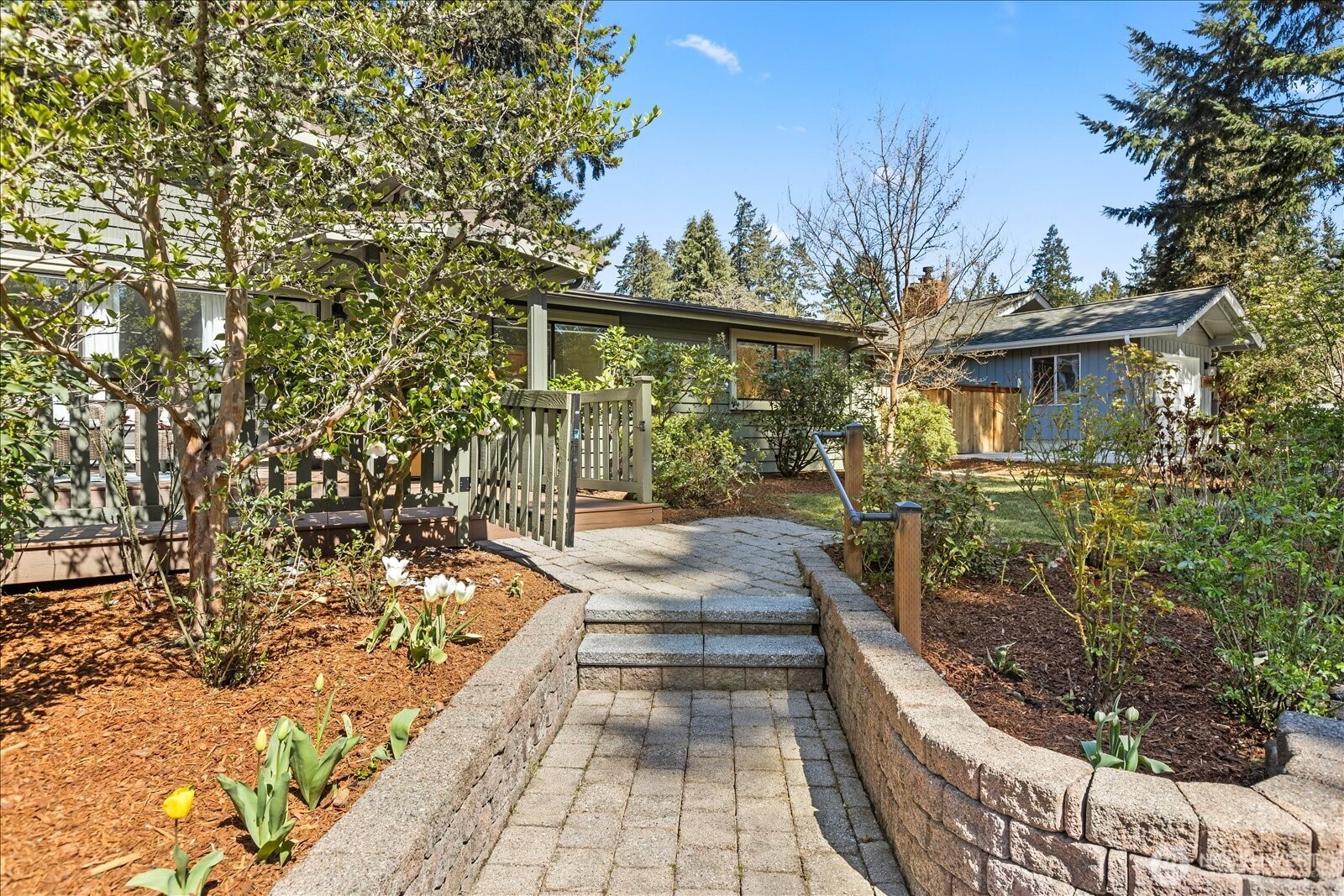 10601 242nd Place Southwest Edmonds, WA 98020 - Photo 4 of 35 a view of a pathway of a house with a yard
