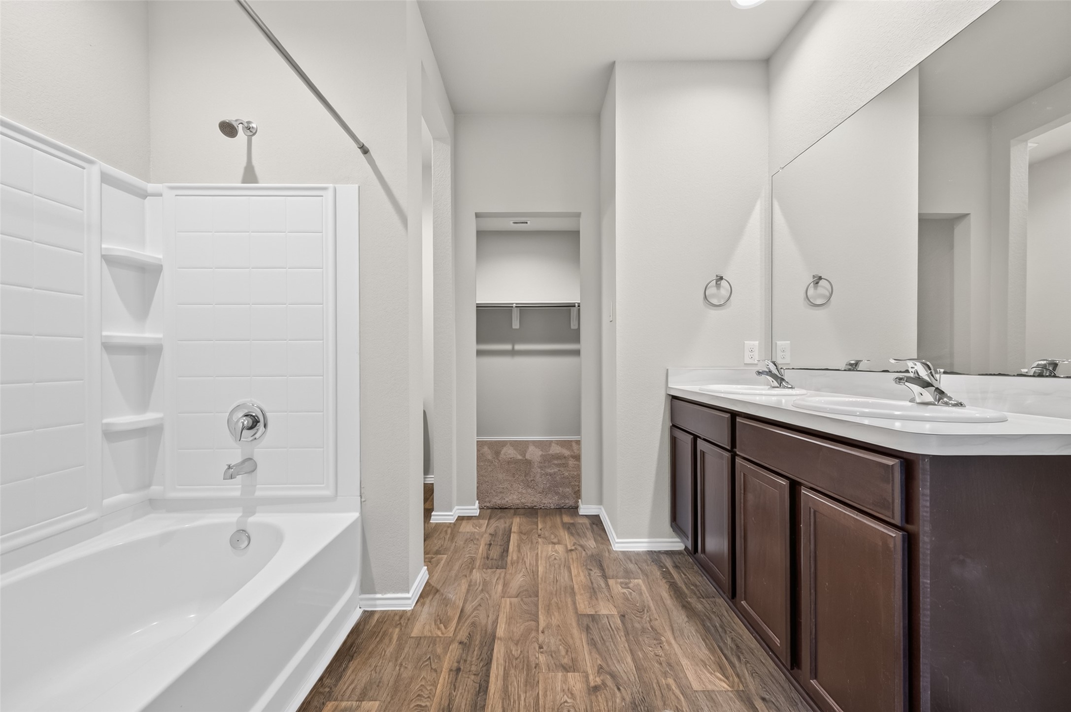 23318 Pelham Prairie Lane Spring, TX 77373 - Photo 27 of 50 a bathroom with a tub sink and mirror