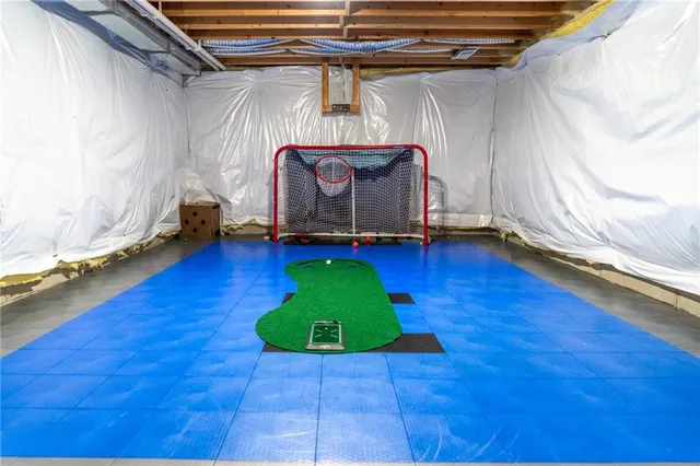 a view of a park with basketball court