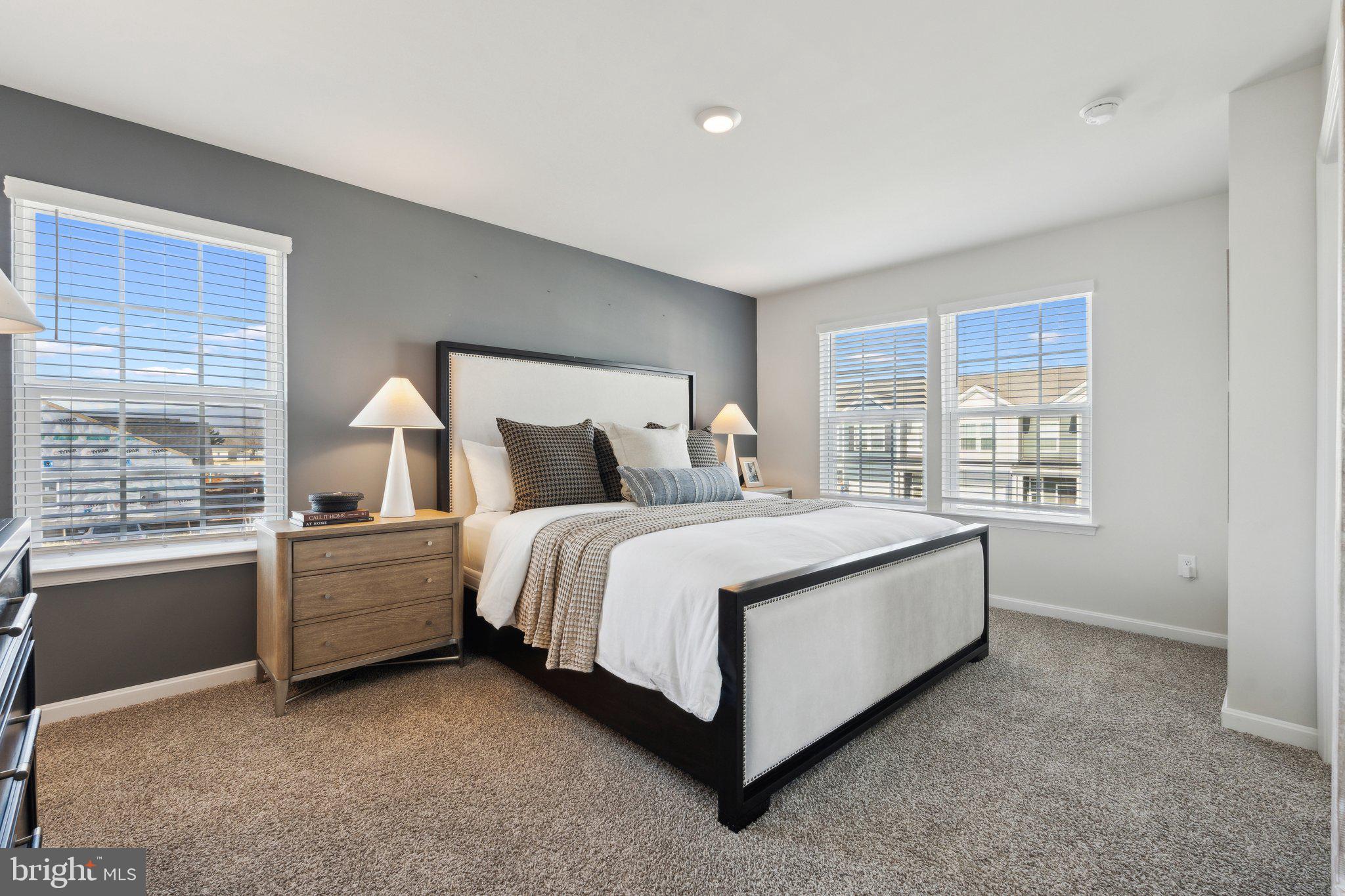 128 Rae Court Luray, VA 22835 - Photo 21 of 30 a spacious bedroom with a bed and a window