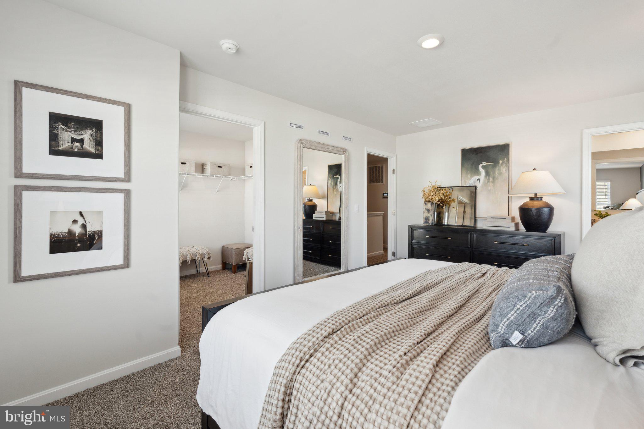 128 Rae Court Luray, VA 22835 - Photo 23 of 30 a bedroom with a bed and a painting on the wall