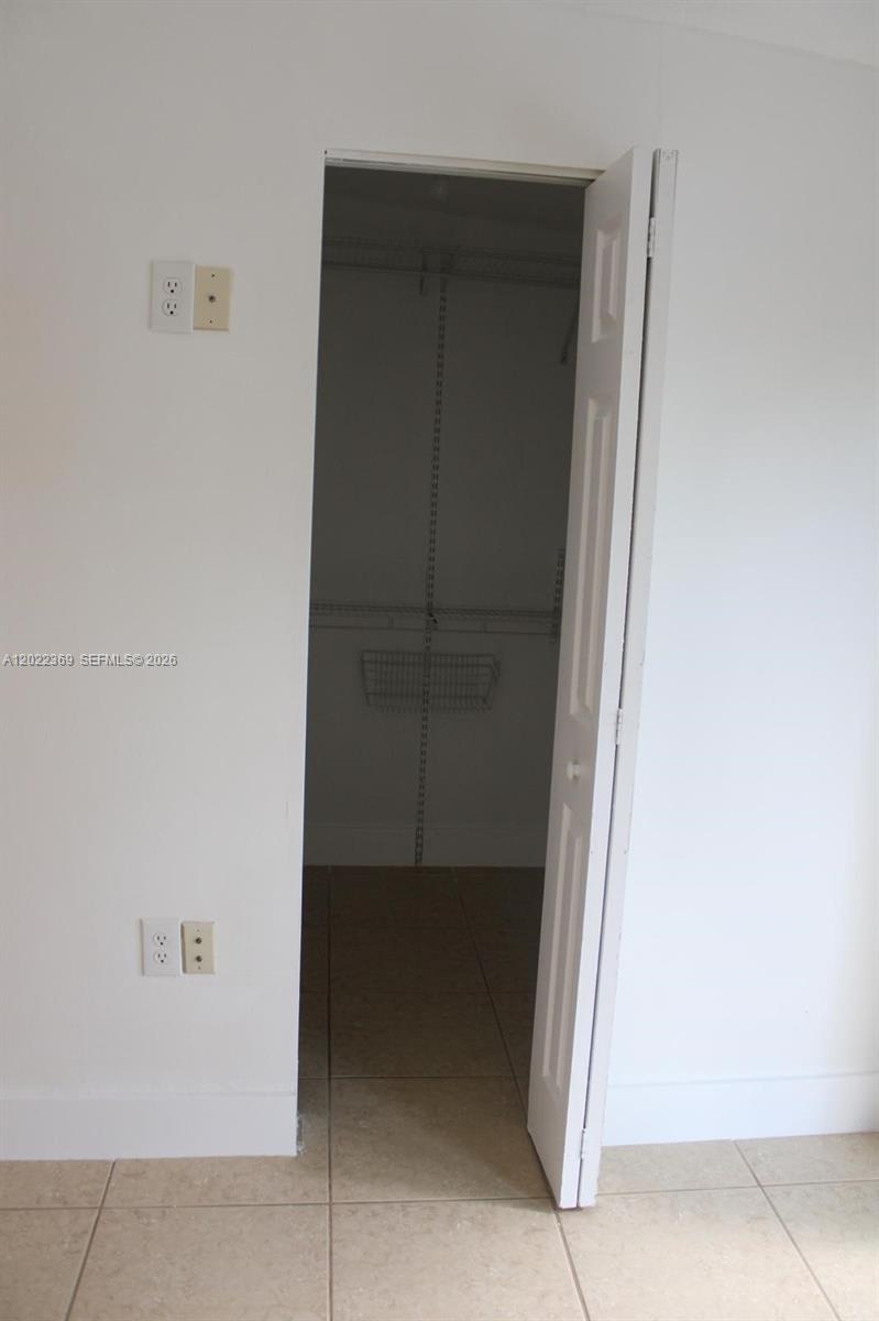 6371 Southwest 109th Court Miami, FL 33173 - Photo 26 of 45 Large Bedroom walk-in closet