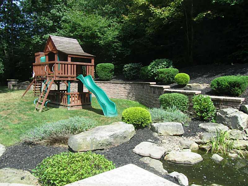 120 South Camp Run Road Fombell, PA 16123 - Photo 19 of 25 Yard/Garden. Playset in back yard.