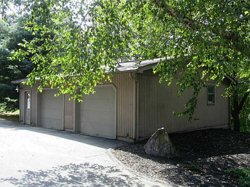 120 South Camp Run Road Fombell, PA 16123 - Photo 20 of 25 Parking Lot/Garage. 2 Car detached garage with plenty of additional parking on large parking pad.