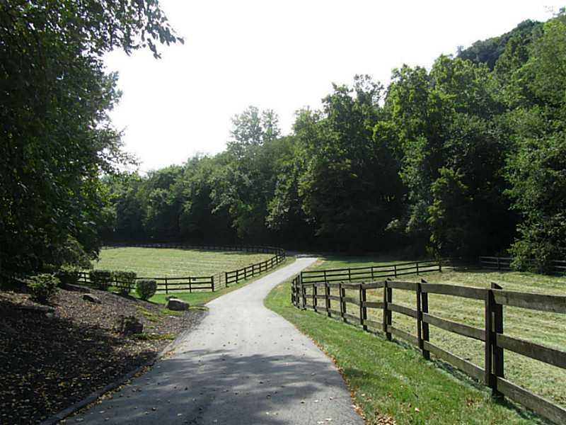 120 South Camp Run Road Fombell, PA 16123 - Photo 24 of 25 Yard/Garden. Driveway from covered bridge to home.