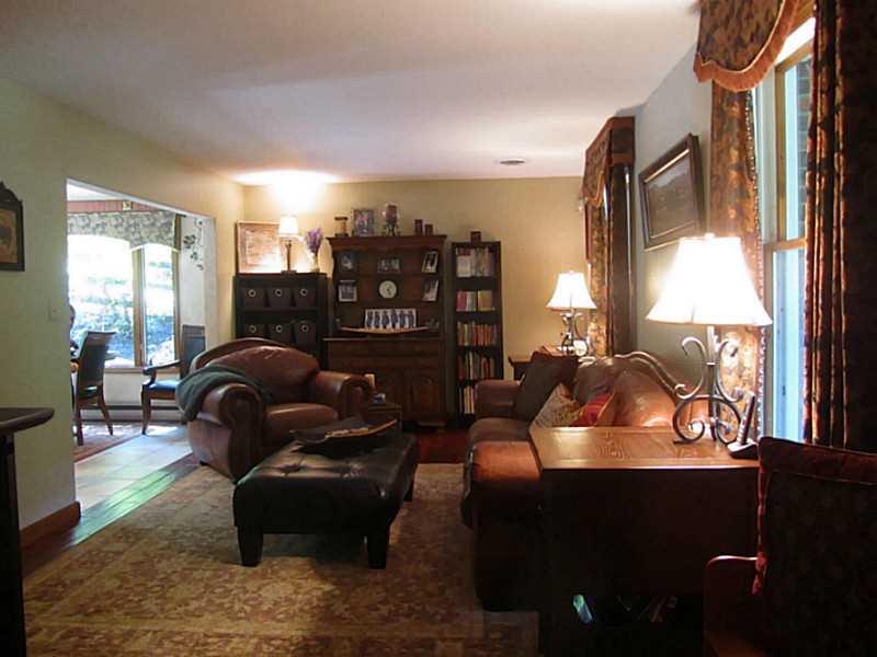 120 South Camp Run Road Fombell, PA 16123 - Photo 10 of 25 Den. This cozy front room with wide plank teak hardwood floor can be used as a den/office, Formal Dining Room or Formal Living Room!