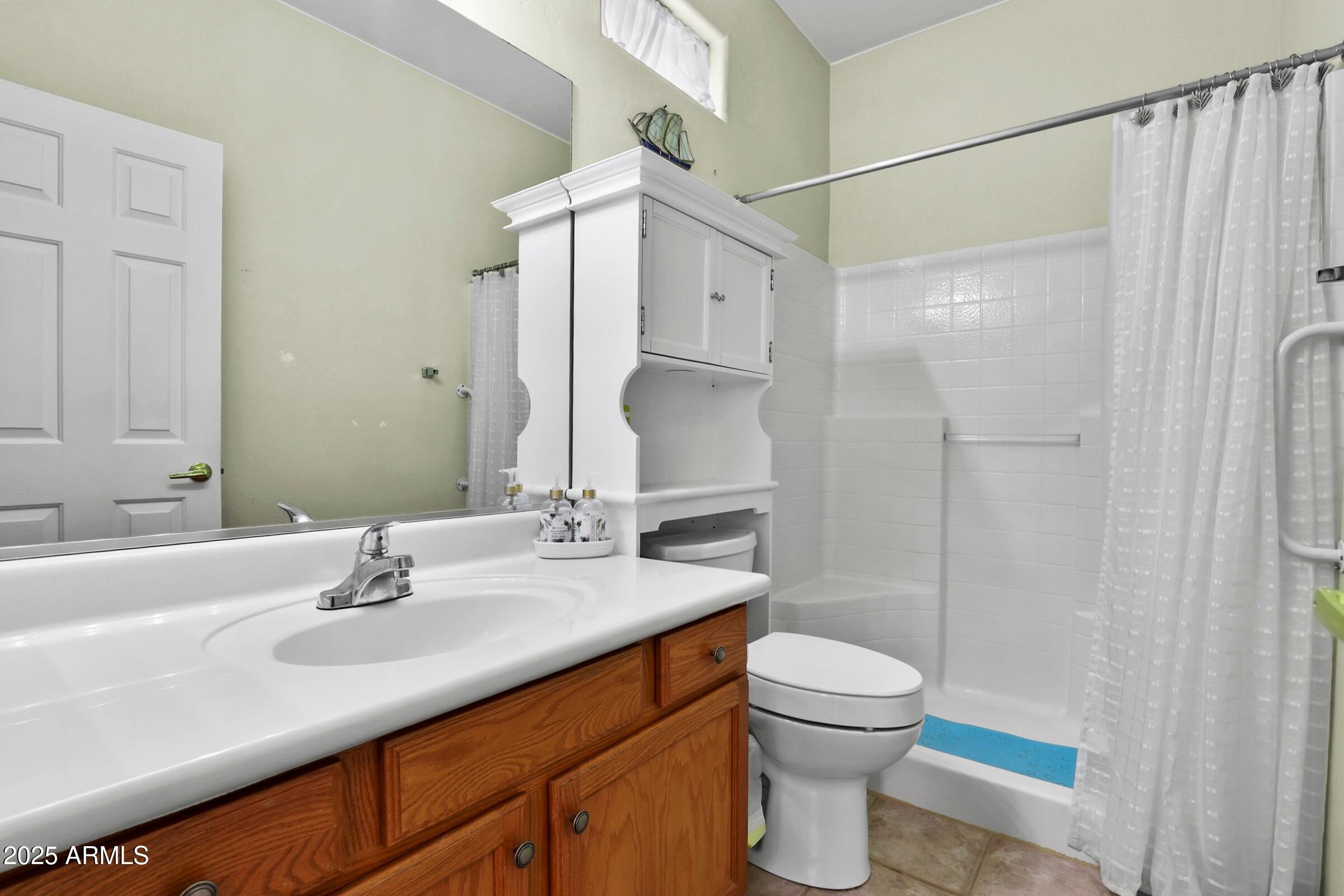 300 West Cody Circle Payson, AZ 85541 - Photo 18 of 25 a bathroom with a sink a toilet and shower