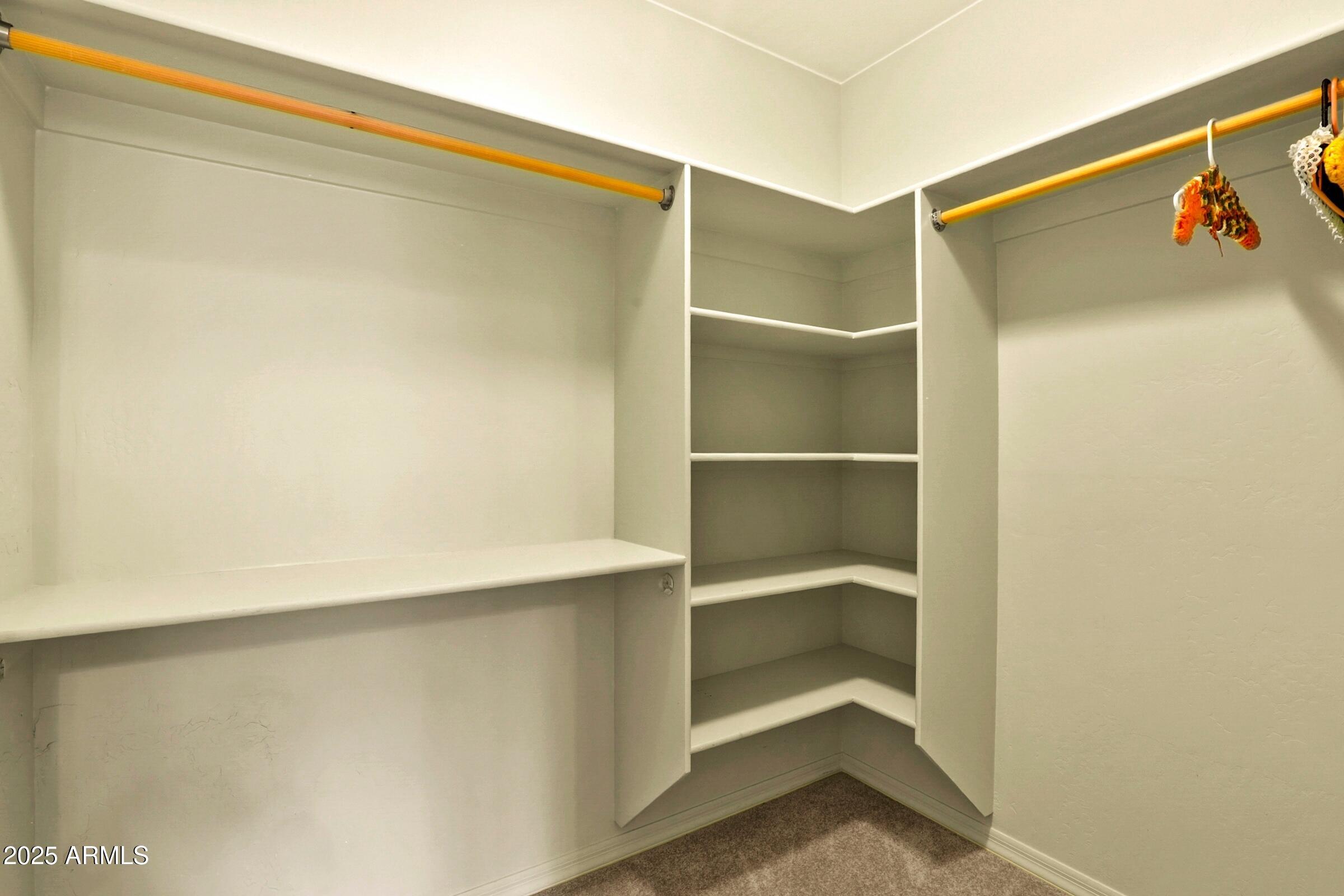 300 West Cody Circle Payson, AZ 85541 - Photo 19 of 25 a view of walk in closet with empty racks