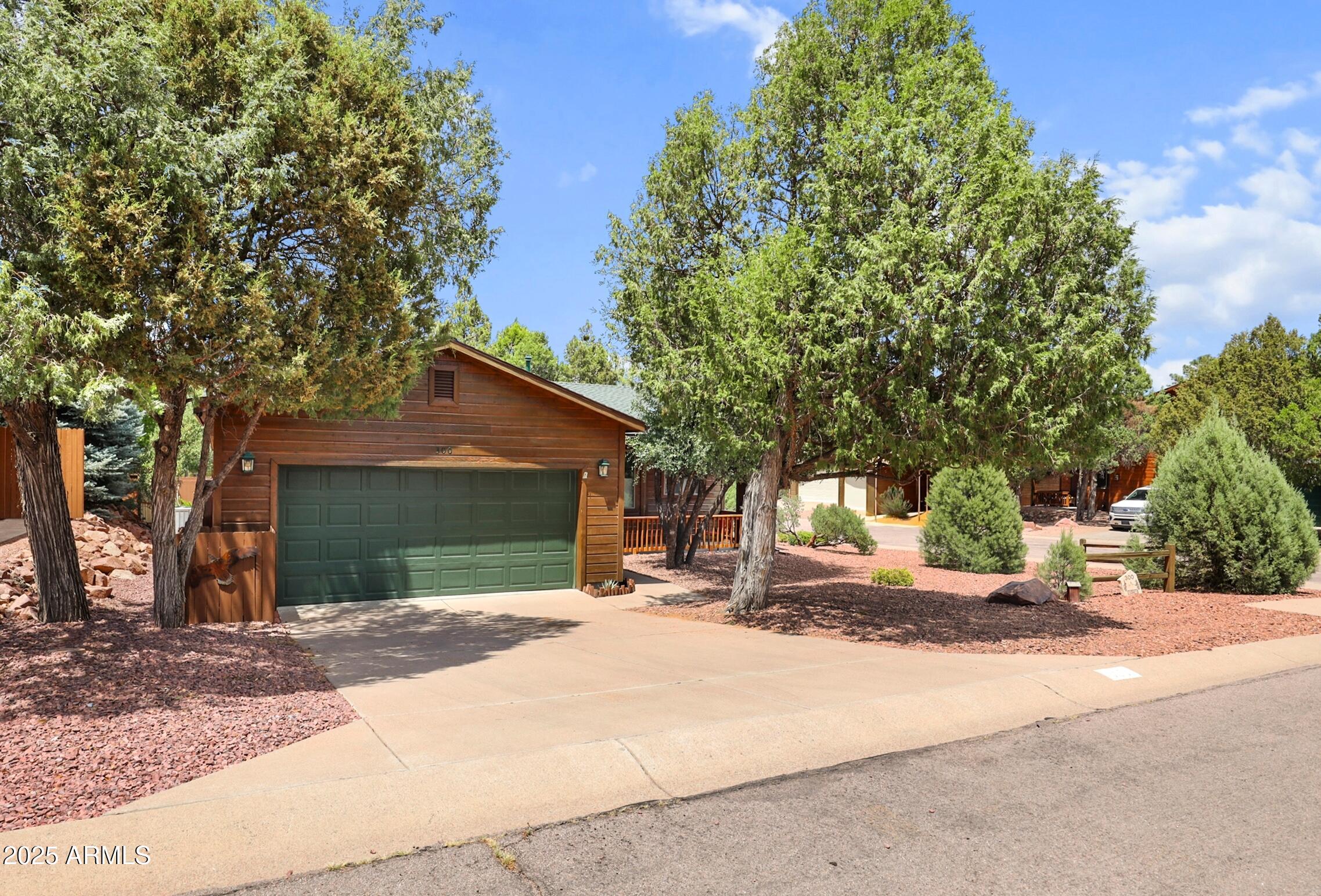 300 West Cody Circle Payson, AZ 85541 - Photo 2 of 25 a house with tree in front of it
