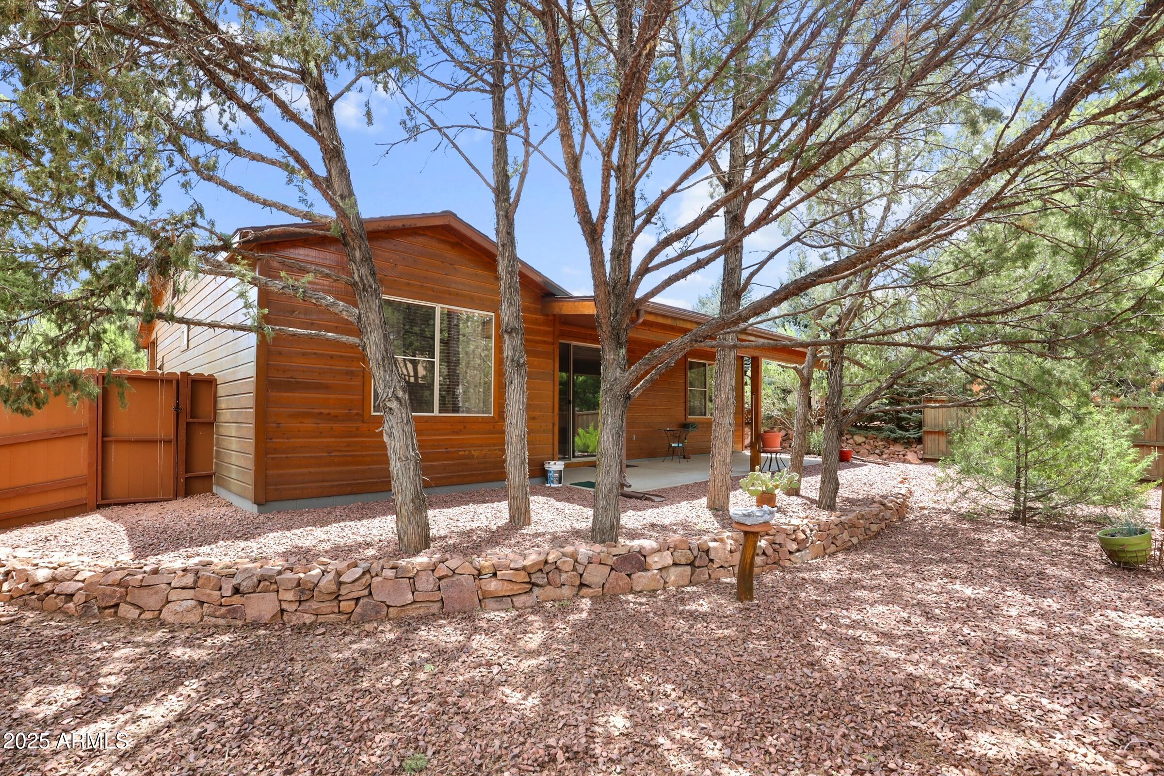 300 West Cody Circle Payson, AZ 85541 - Photo 9 of 25 a view of a house with a yard covered in snow