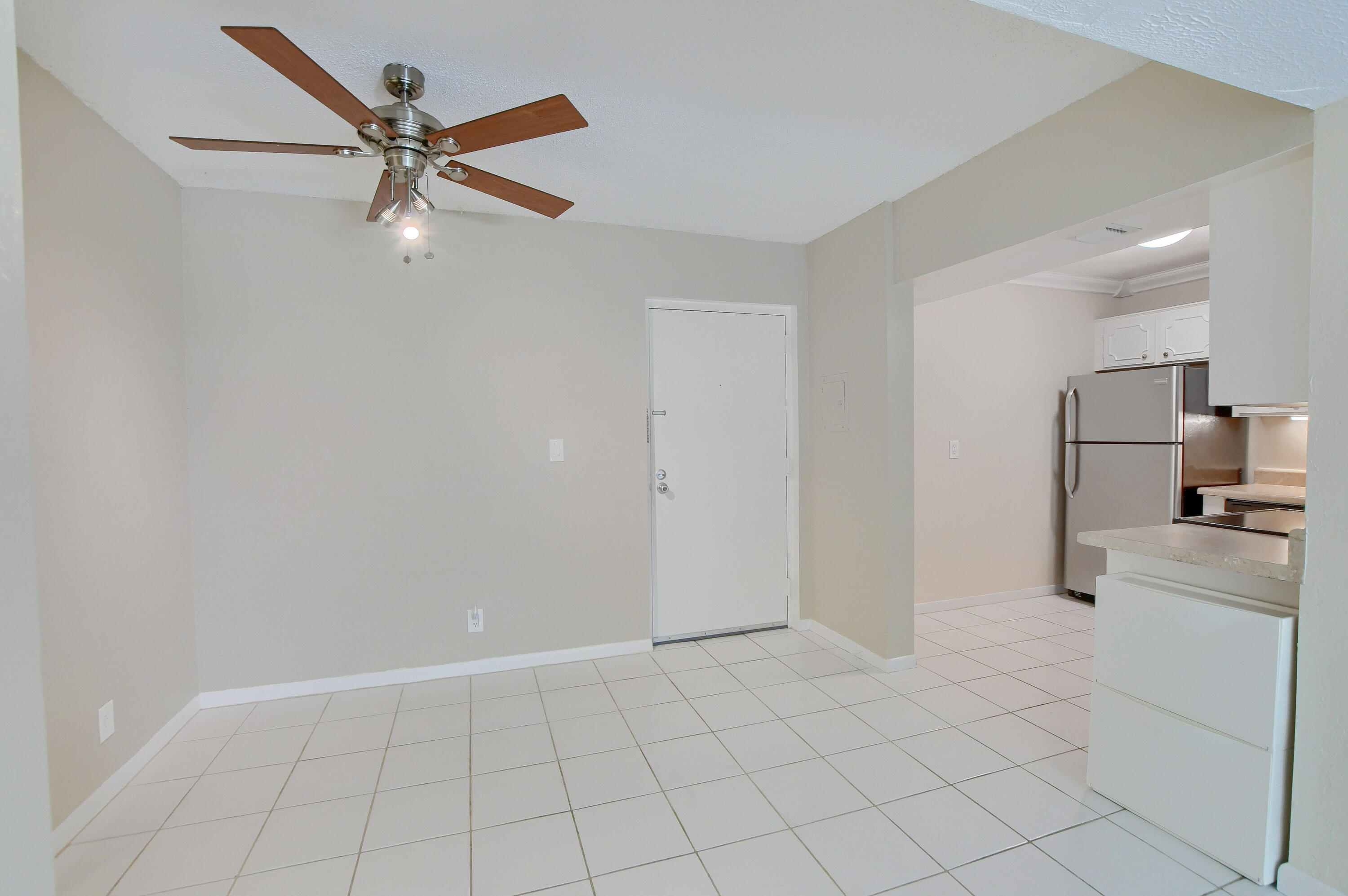 450 Northwest 20th Street, Unit 106 Boca Raton, FL 33431 - Photo 2 of 24 DINING AREA AND ENTRY